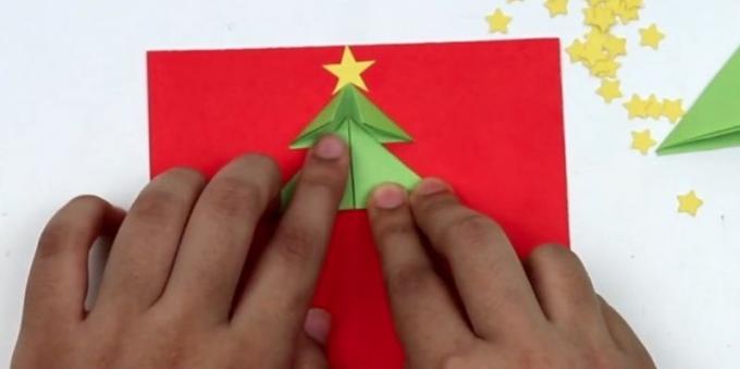 elleri ile Noel kartları: İkinci parça tutkal