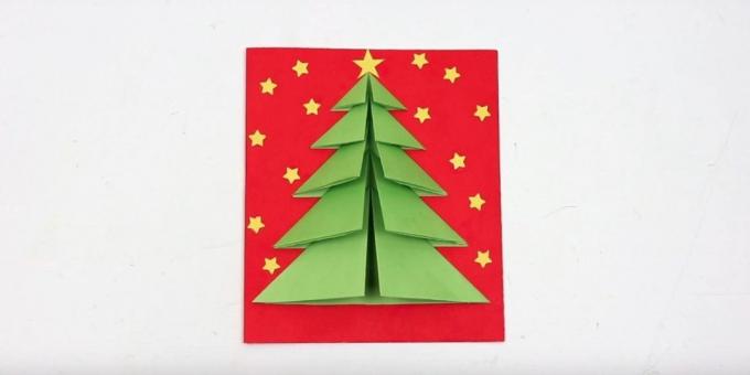hacmin kapağında Noel ağacı ile Noel kartı