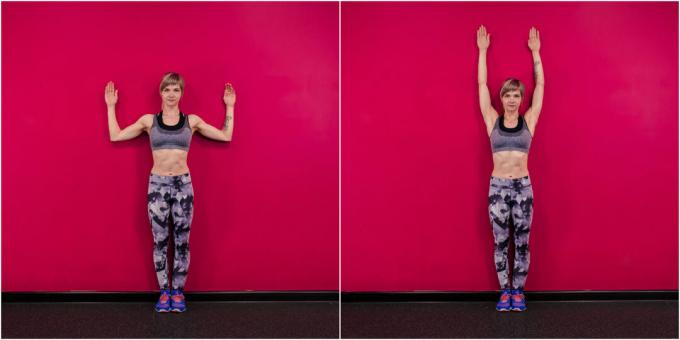 Göğüslerinizi egzersizle nasıl büyütebilirsiniz: Kollarınızı bir duvarın yanında kaldırmak